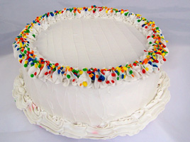 Large Vanilla Frosted Birthday Cake with Primary Sprinkles